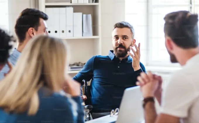 Marketing team collaborating on branded videos using Private Stock Collections in Visla